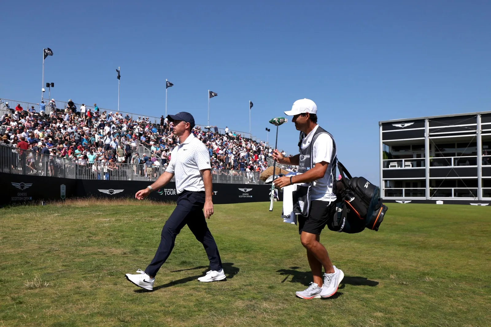 Genesis Scottish Open: Rory McIlroy shares early lead with Scottie Scheffler in contention on bunched leaderboard