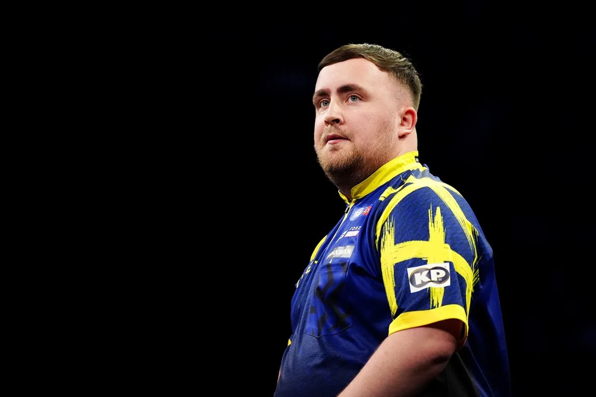 World Matchplay: Luke Littler throws nine-darter in thrilling win over Nathan Aspinall at Winter Gardens in Blackpool