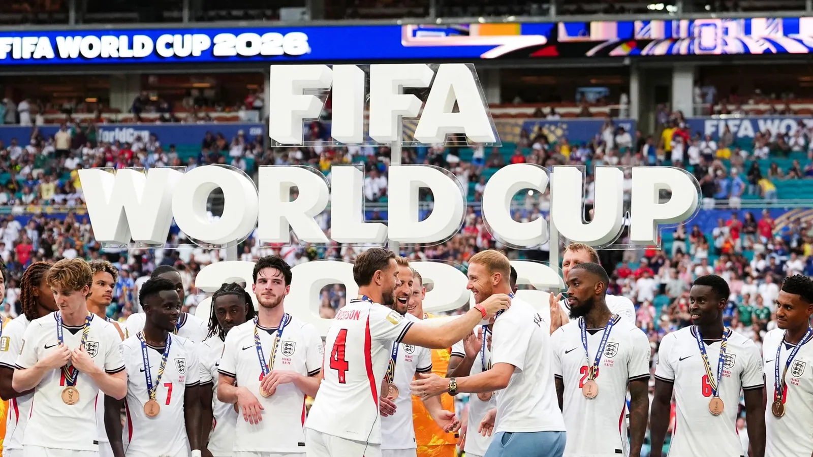 England collect their bronze medals at the World Cup