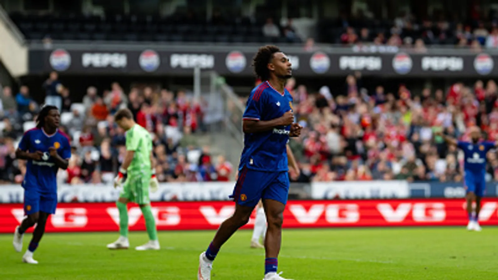 TRONDHEIM, NORWAY - JULY 24: Joshua Kirkzee of Manchester United celebrates scoring their second goal during the pre-season friendly match between Rosenborg and Manchester United at Lerkendal Stadion on July 24, 2026 in Trondheim, Norway. (Photo by Ash Donelon/Manchester United via Getty Images)