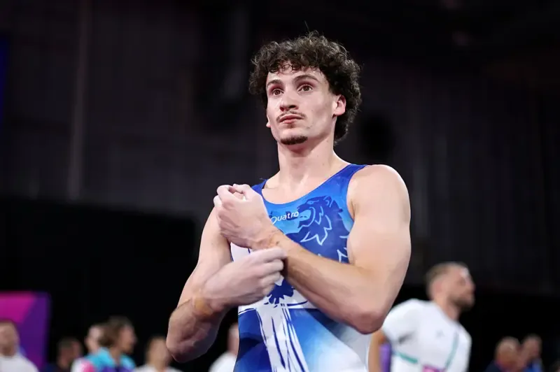 Reuben Ward of Team Scotland looks on during the Men's All-Around Final