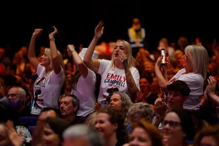 Emily Campbell’s fans cheer her on during the women's +86kg weightlifting.