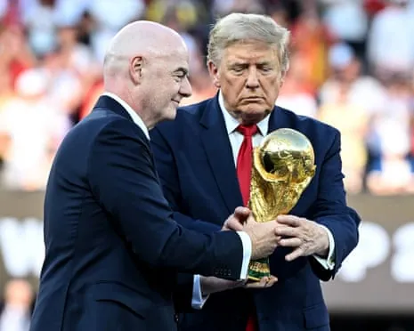 Fifa president Gianni Infantino and US president Donald Trump with the World Cup trophy at this year’s final.