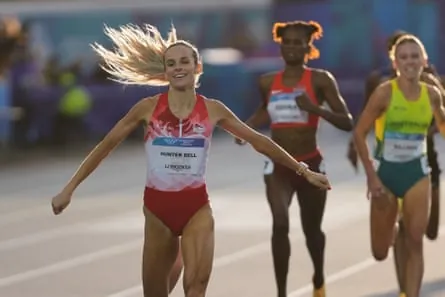 Georgia Hunter Bell stretches out her arms as she wins the 800m.